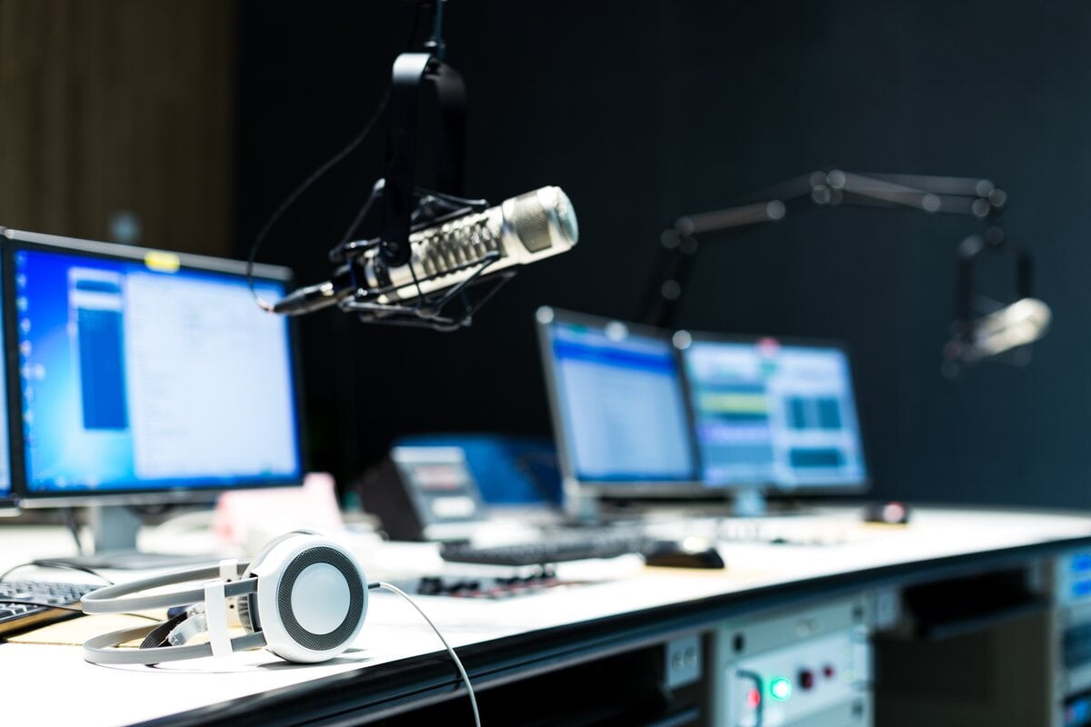 Radio and television studio: microphone, monitors and playout desk